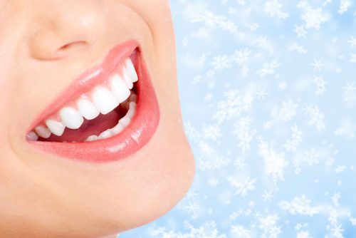 Woman Smiling with Snowflake Background